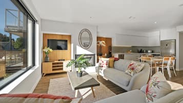 Premium Apartment, 3 Bedrooms, Mountain View | Living room | 40-inch TV with satellite channels, fireplace