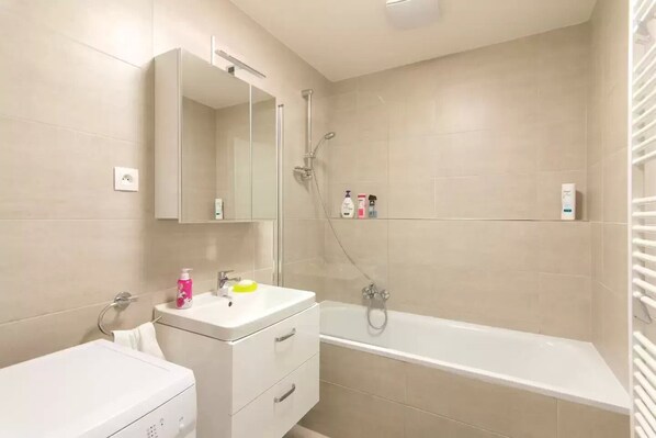 Hair dryer, towels, soap, shampoo