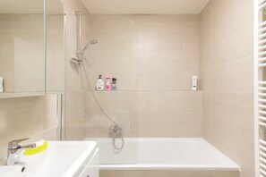 Hair dryer, towels, soap, shampoo