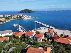 Water, Sky, Building, Azure, Boat, Cloud, Coastal And Oceanic Landforms, Tree, House, Landscape