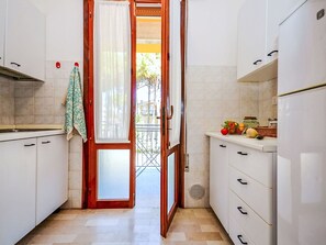 Microwave, highchair, dining tables