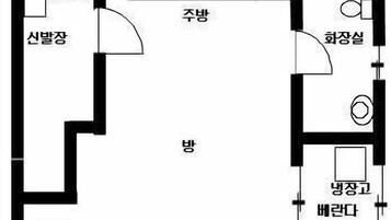 Plano de planta de un hotel que muestra un dormitorio, baño, cocina y sala de estar.