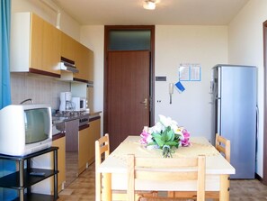Microwave, high chair, dining tables