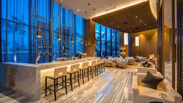Lobby lounge, poolside views, open daily