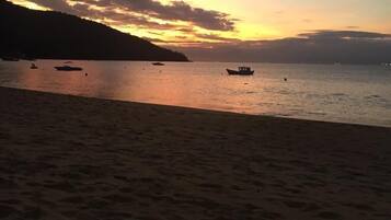 On the beach, white sand