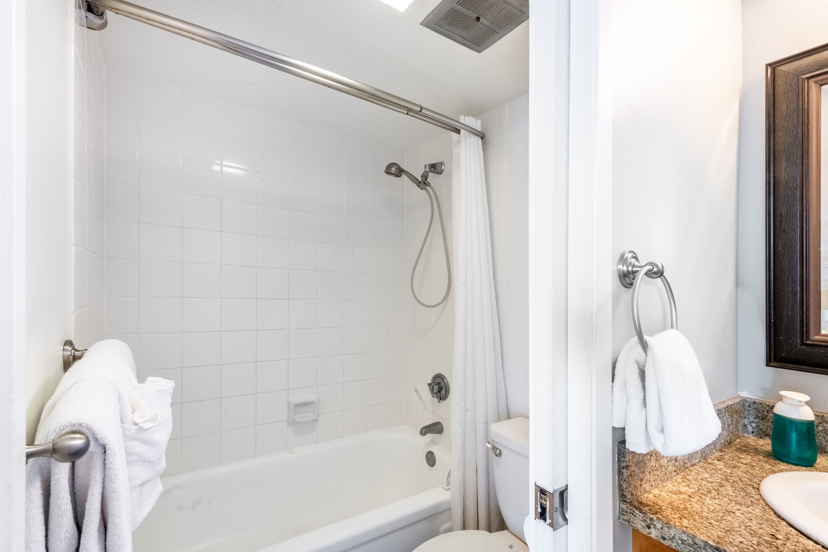 Bathtub, hair dryer, towels