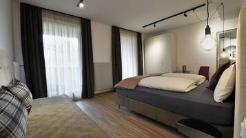 Desk, laptop workspace, free WiFi, bed sheets