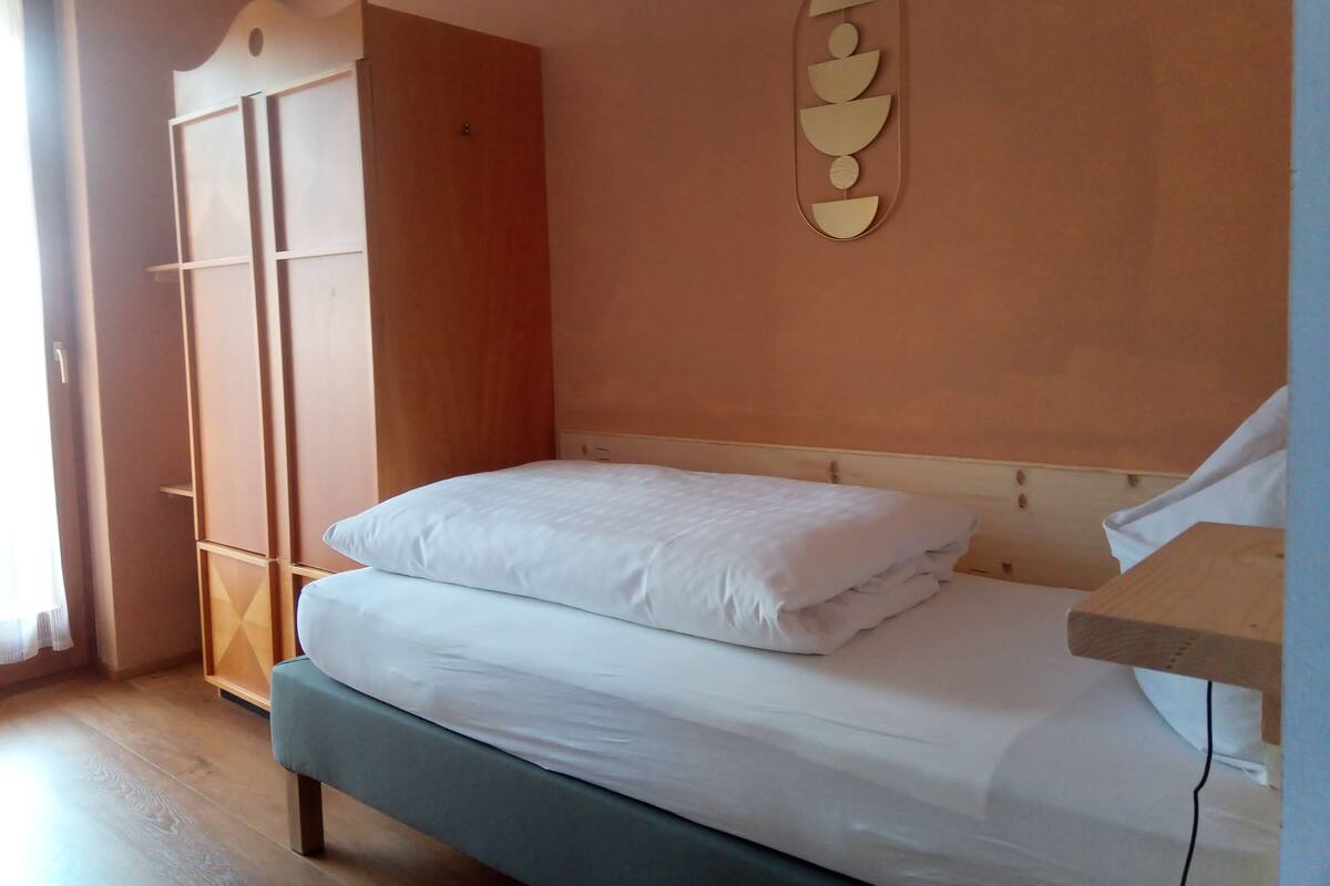 Desk, laptop workspace, free WiFi, bed sheets