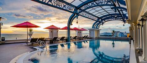 Outdoor pool, pool umbrellas, pool loungers