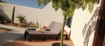 Stylish and serene south facing bungalow with private garden and pool.