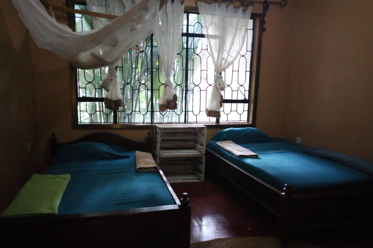 Blackout curtains, iron/ironing board, bed sheets