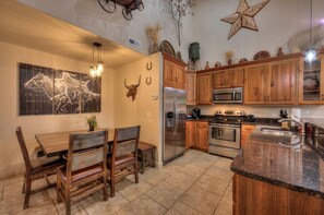 Microwave, dishwasher, coffee/tea maker, cookware/dishes/utensils