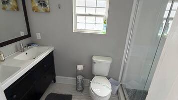 Combined shower/tub, hair dryer, towels, soap