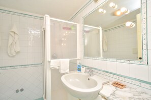 Hair dryer, towels, soap, shampoo