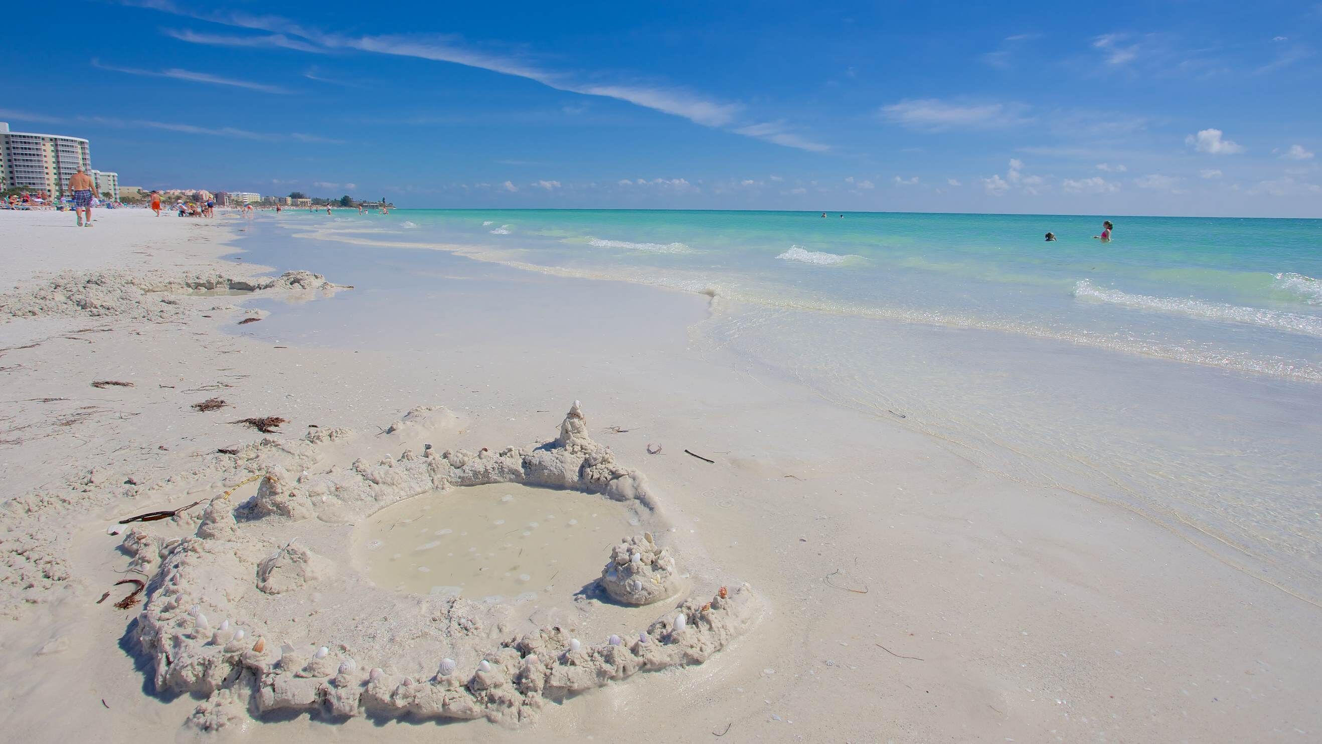 On the beach, sun loungers, beach towels