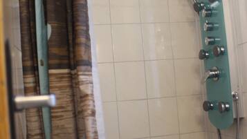 Combined shower/tub, soap, toilet paper