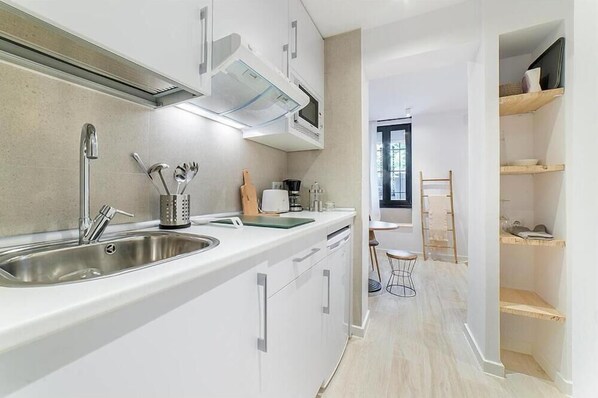 Superior Apartment, City View | Private kitchen | Fridge, microwave, stovetop, coffee/tea maker