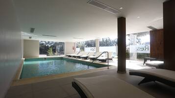 Indoor pool, outdoor pool, open 8:00 AM to 8:00 PM, pool loungers