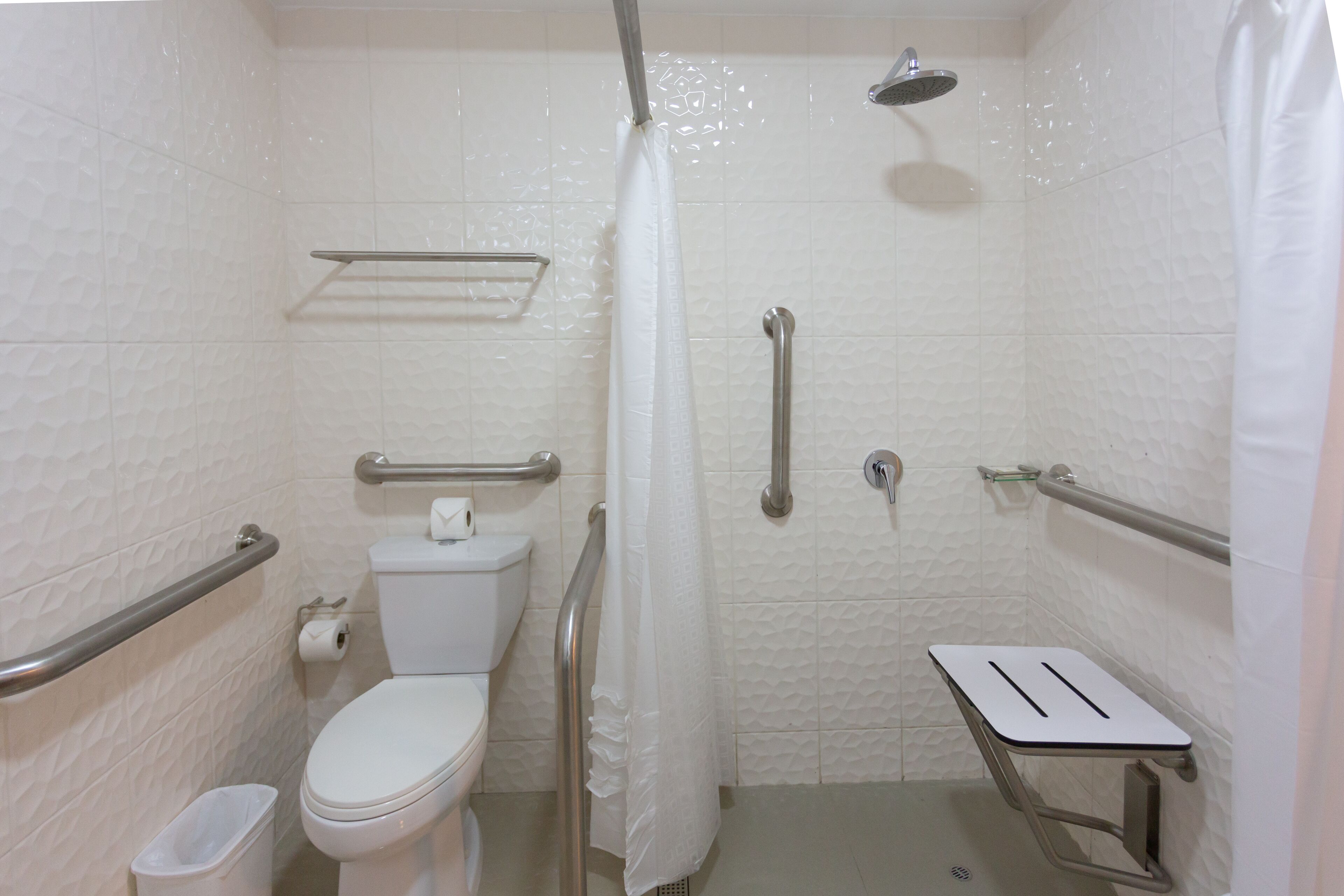 shower, rainfall showerhead, hair dryer, towels