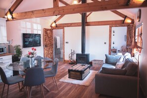 Apartment, 2 Bedrooms, Hot Tub (Wensleydale Suite) | Living area | Flat-screen TV, fireplace - Cheesemans farm house stables (Ramsgate)