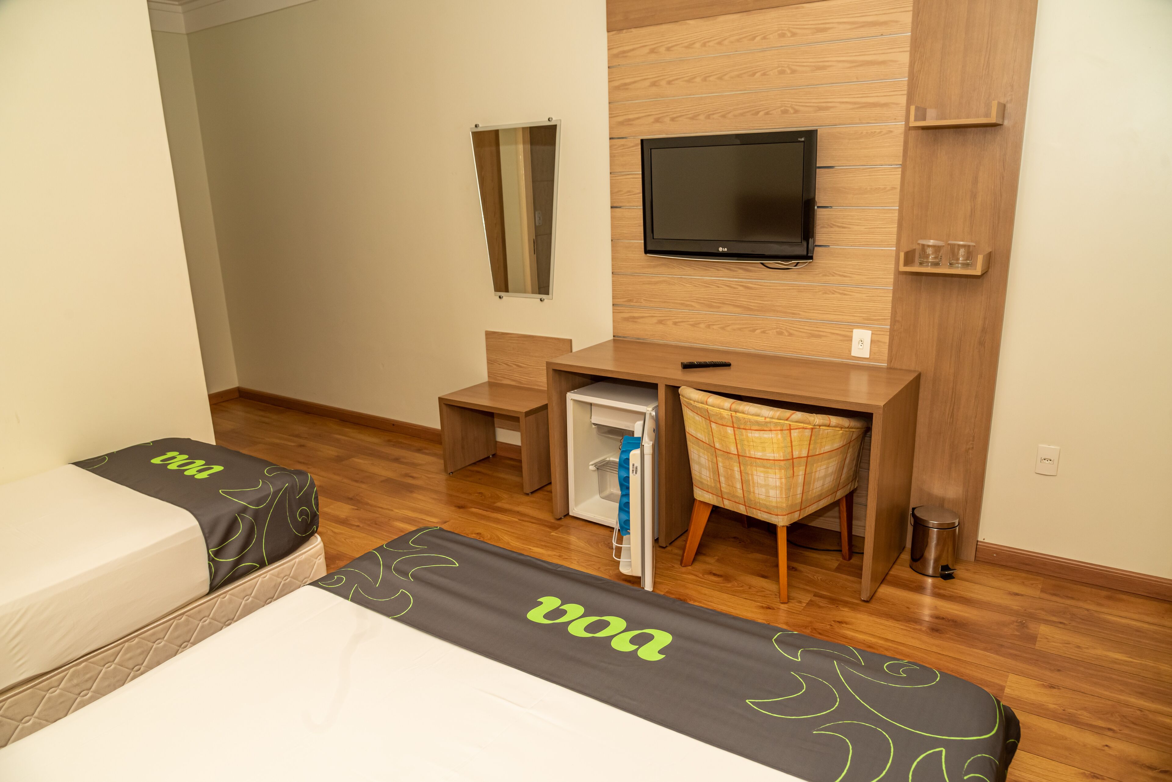Superior Triple Room | Minibar, desk, laptop workspace, blackout curtains