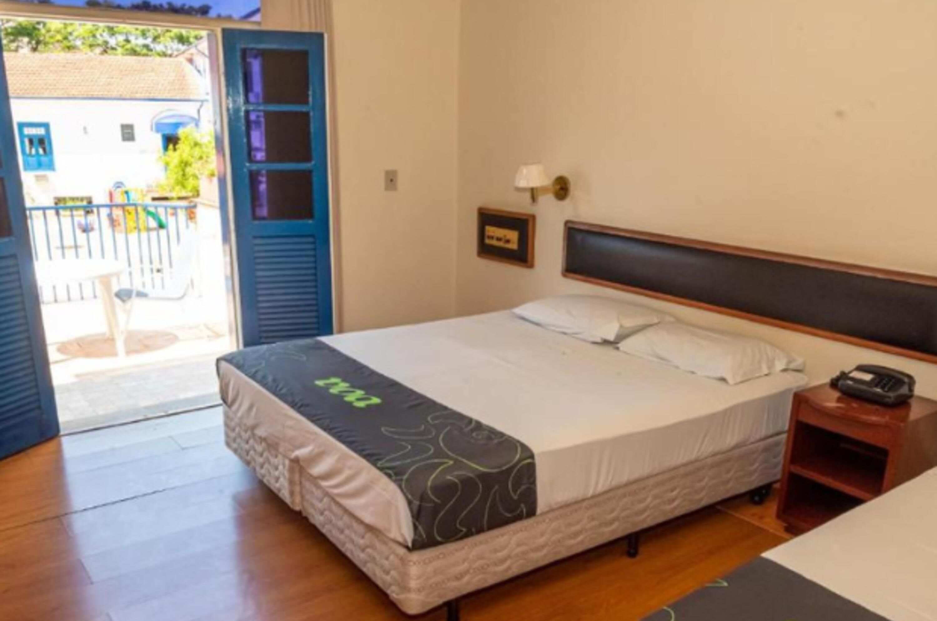 Minibar, desk, laptop workspace, blackout curtains