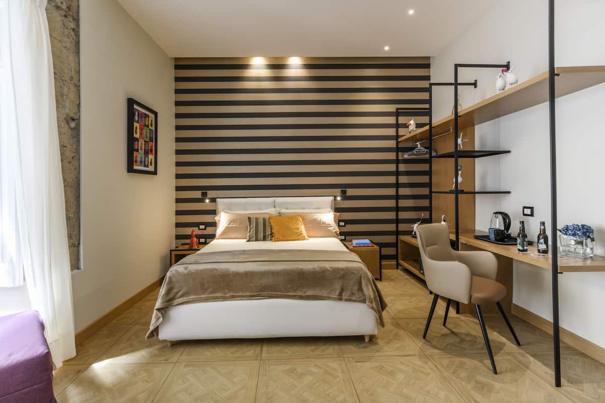 Deluxe Double Room | Minibar, in-room safe, individually furnished, desk
