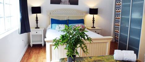 1 bedroom, desk, iron/ironing board, travel crib