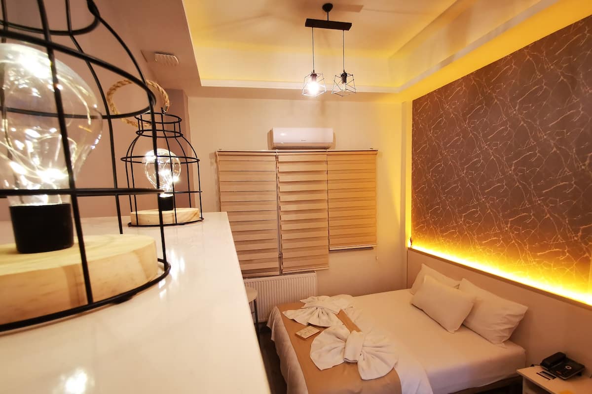 Premium bedding, blackout drapes, soundproofing