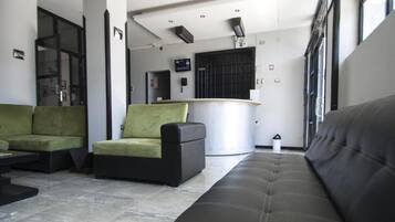 32-inch flat-screen TV with cable channels, TV