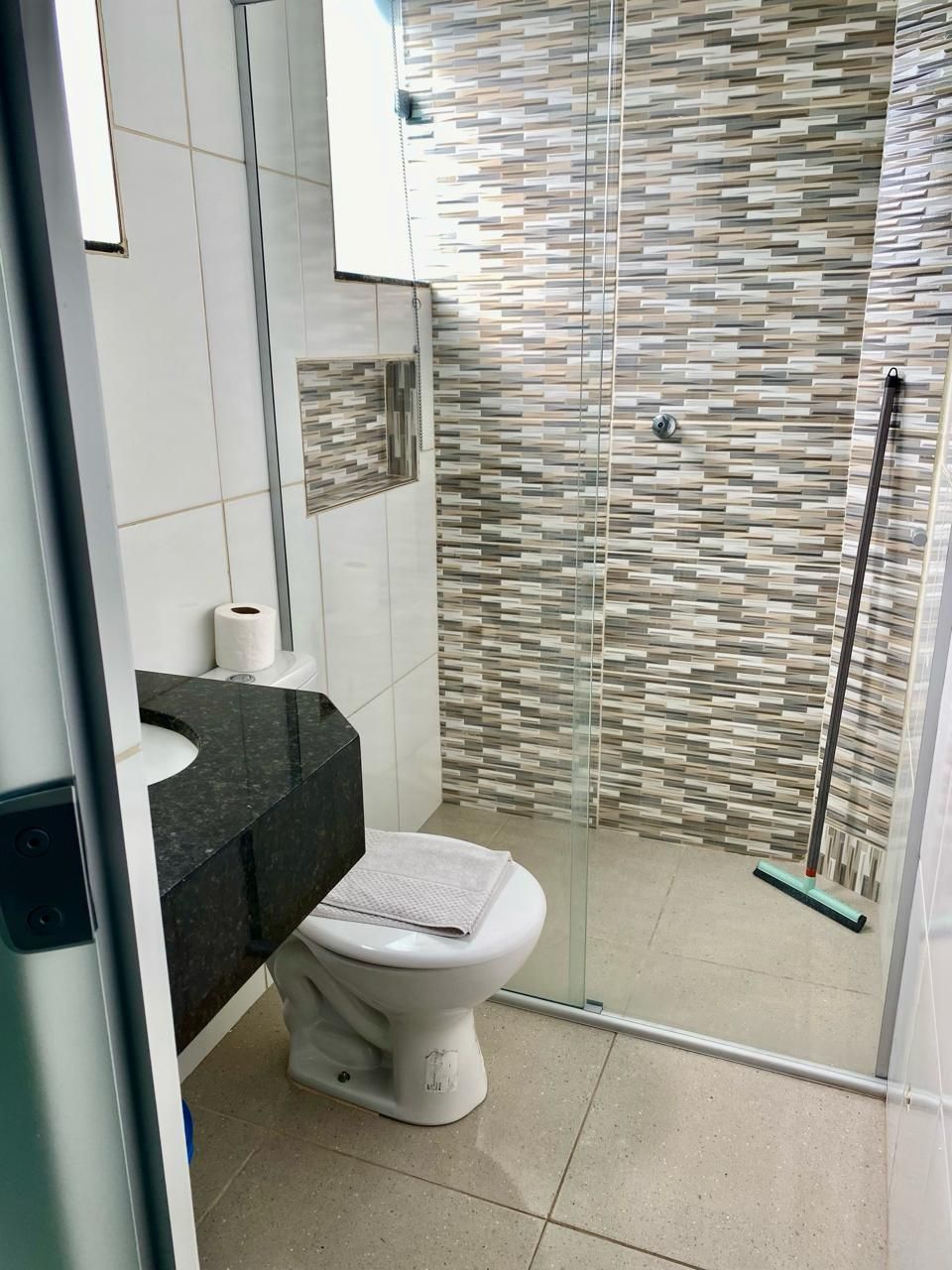 Shower, towels, soap, toilet paper