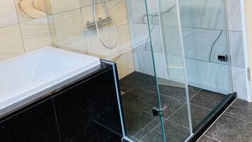 Shower, free toiletries, hair dryer, slippers