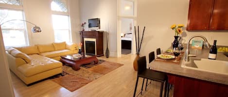 Flat-screen TV, fireplace