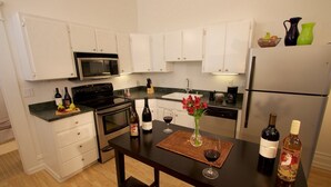 Coffee/tea maker, fridge, microwave, oven - Five — King Bed, Historic Downtown Apartment in Nicely Appointed Building on Main Street (Walla Walla)