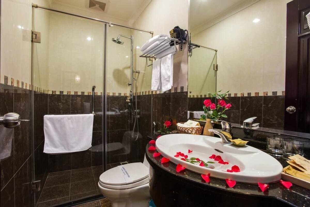 Shower, rainfall showerhead, designer toiletries, hair dryer
