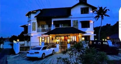Stay In the city. But in a village ambience.. Over looking the forest