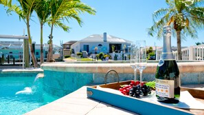 A heated pool, pool loungers