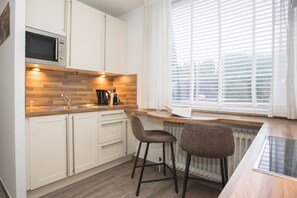 Fridge, microwave, dishwasher, highchair