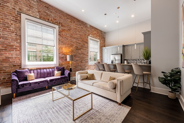 Bold & fun open-concept living and kitchen with plenty of comfortable seating. Enjoy a 65” Samsung Smart 4K TV with streaming and DIRECTV Entertainment. The sofa also converts to a queen-size sleeper sofa! Plus, lots of natural light!