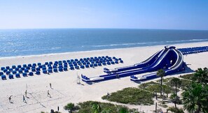 On the beach, sun-loungers, beach towels