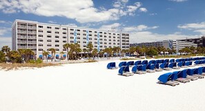 On the beach, sun-loungers, beach towels