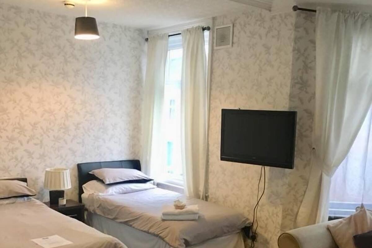 家庭套房, 2 间卧室 | 熨斗/熨衣板、免费 WiFi、特色装修、特色家居