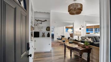 Smart TV, fireplace, books, offices