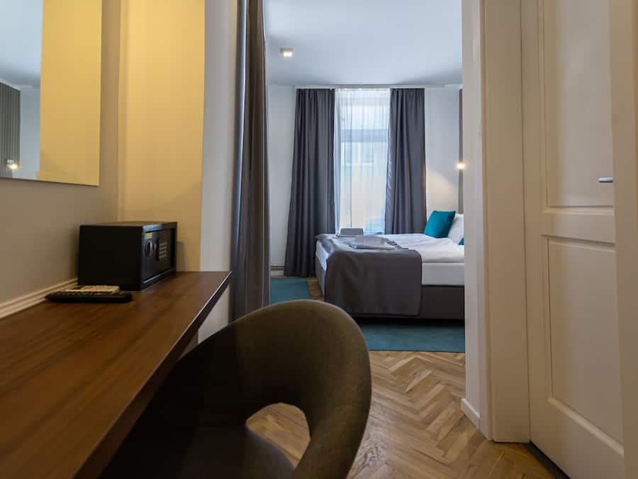 Deluxe Double or Twin Room | Desk, blackout curtains, iron/ironing board, free cots/infant beds