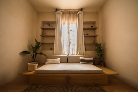 Family Room | 1 bedroom, premium bedding, down comforters, minibar