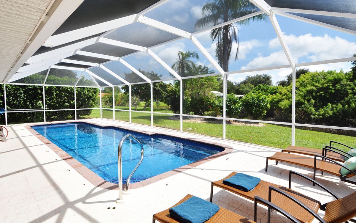 BEAUTIFUL, SPACIOUS LAKEFRONT VILLA WITH HEATED POOL, CLOSE TO THE BEACH