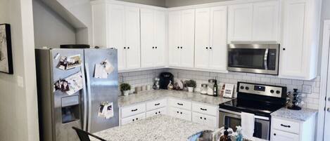 Microwave, dishwasher, cookware/dishes/utensils