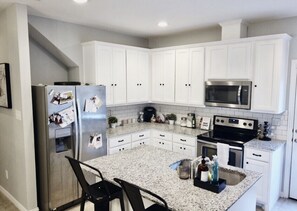 Microwave, dishwasher, cookware/dishes/utensils