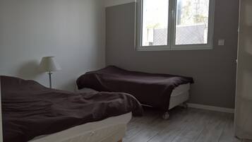 3 dormitorios, tabla de planchar con plancha, wifi gratis y ropa de cama