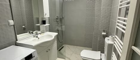 Grand Apartment (2+1) | Bathroom | Shower, rainfall showerhead, slippers, towels
